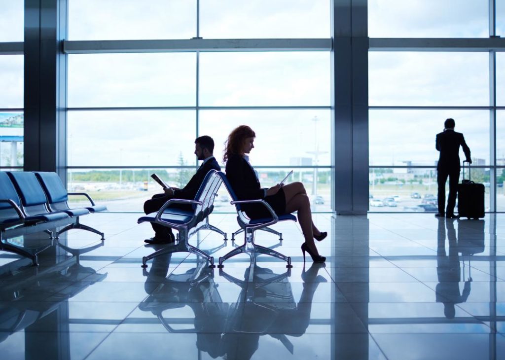 Business travelers waiting in the airport.