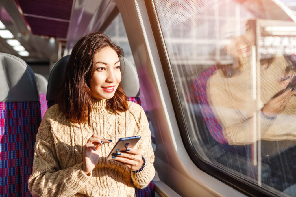 Woman traveling by train