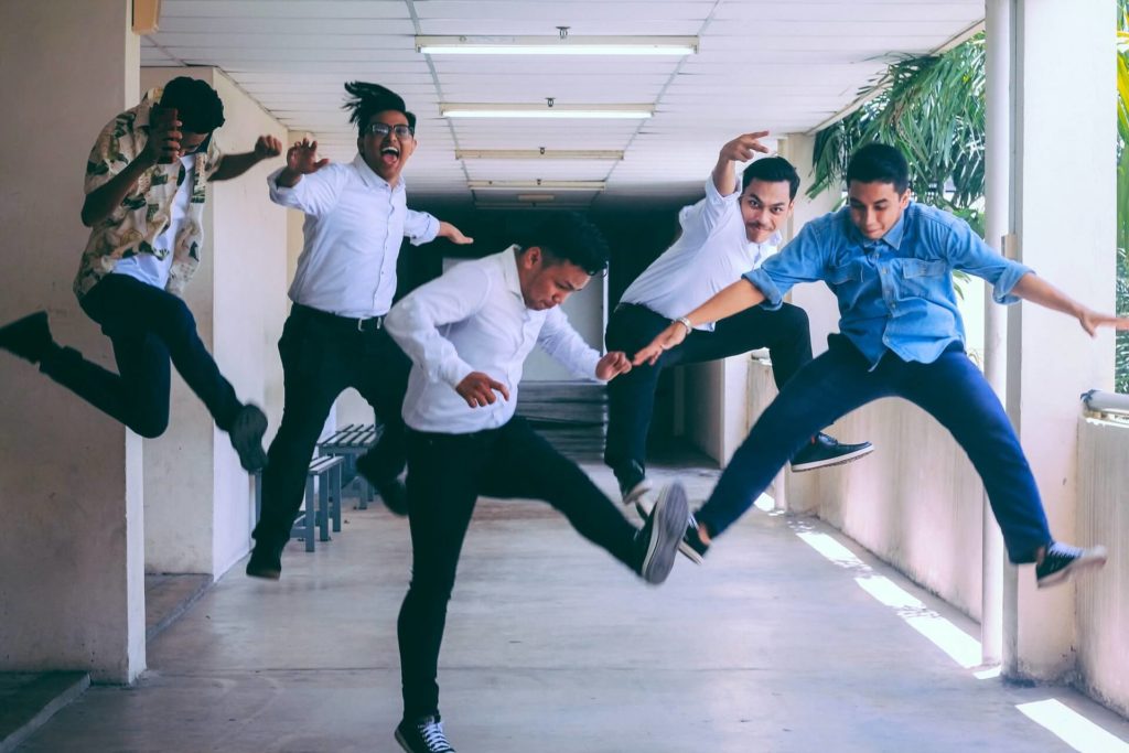 employees jumping happily