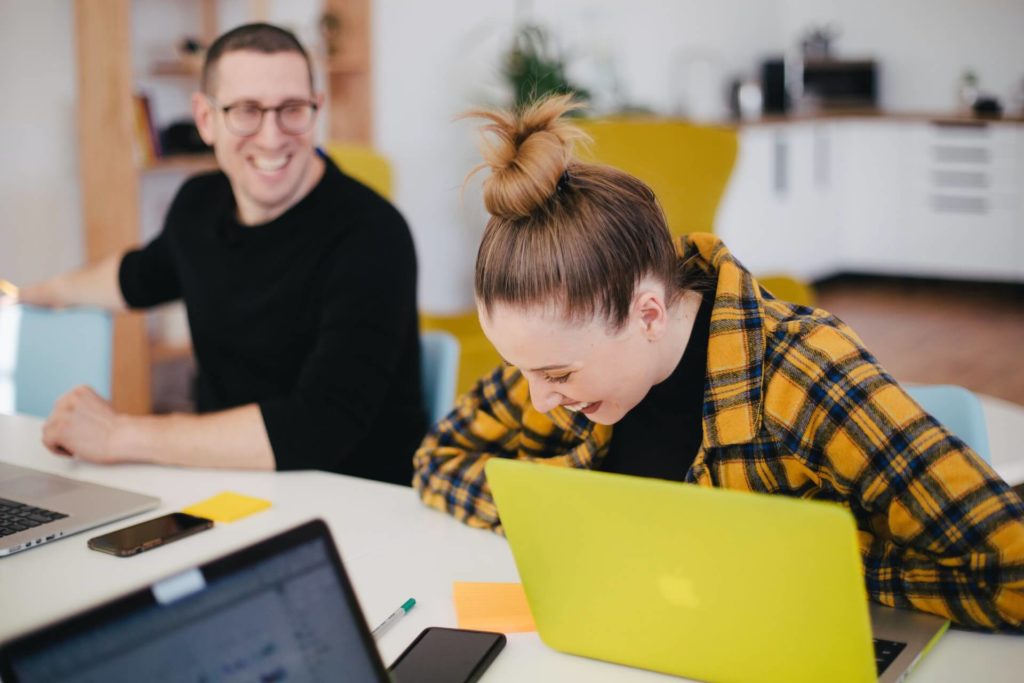 girl laughing with colleague