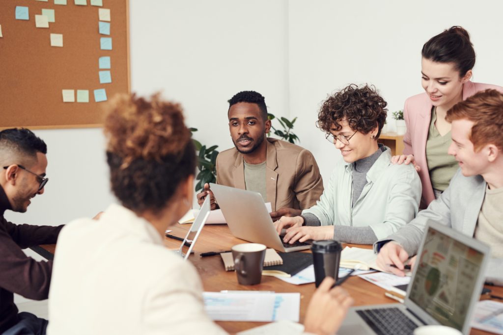 Happy employees working together
