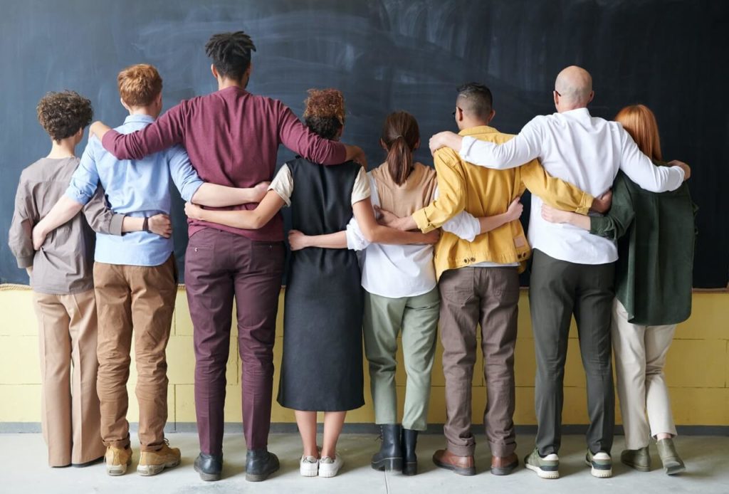 people facing a wall