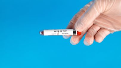 What happens if I test positive for COVID-19 before a trip?