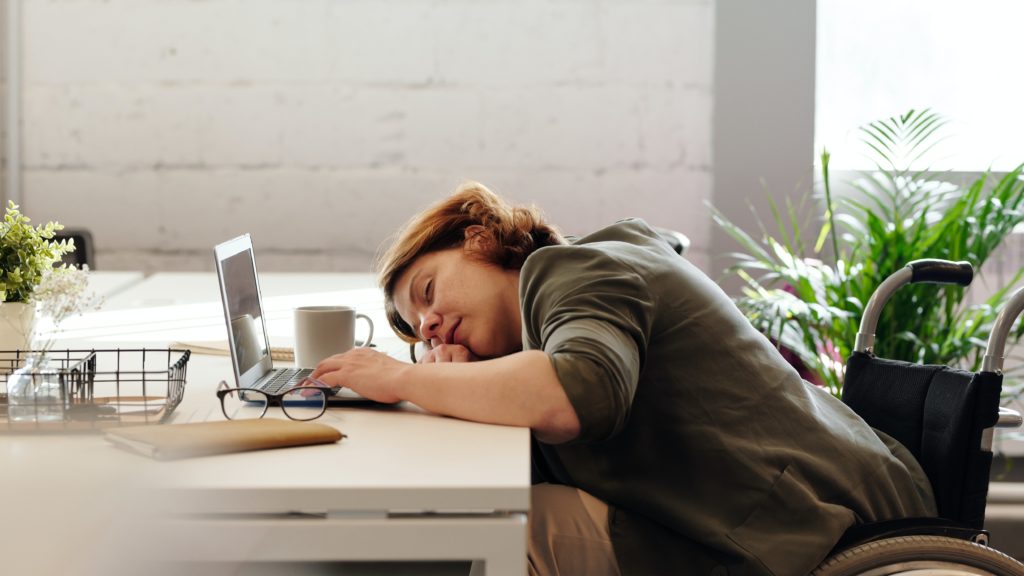 Woman asleep at work